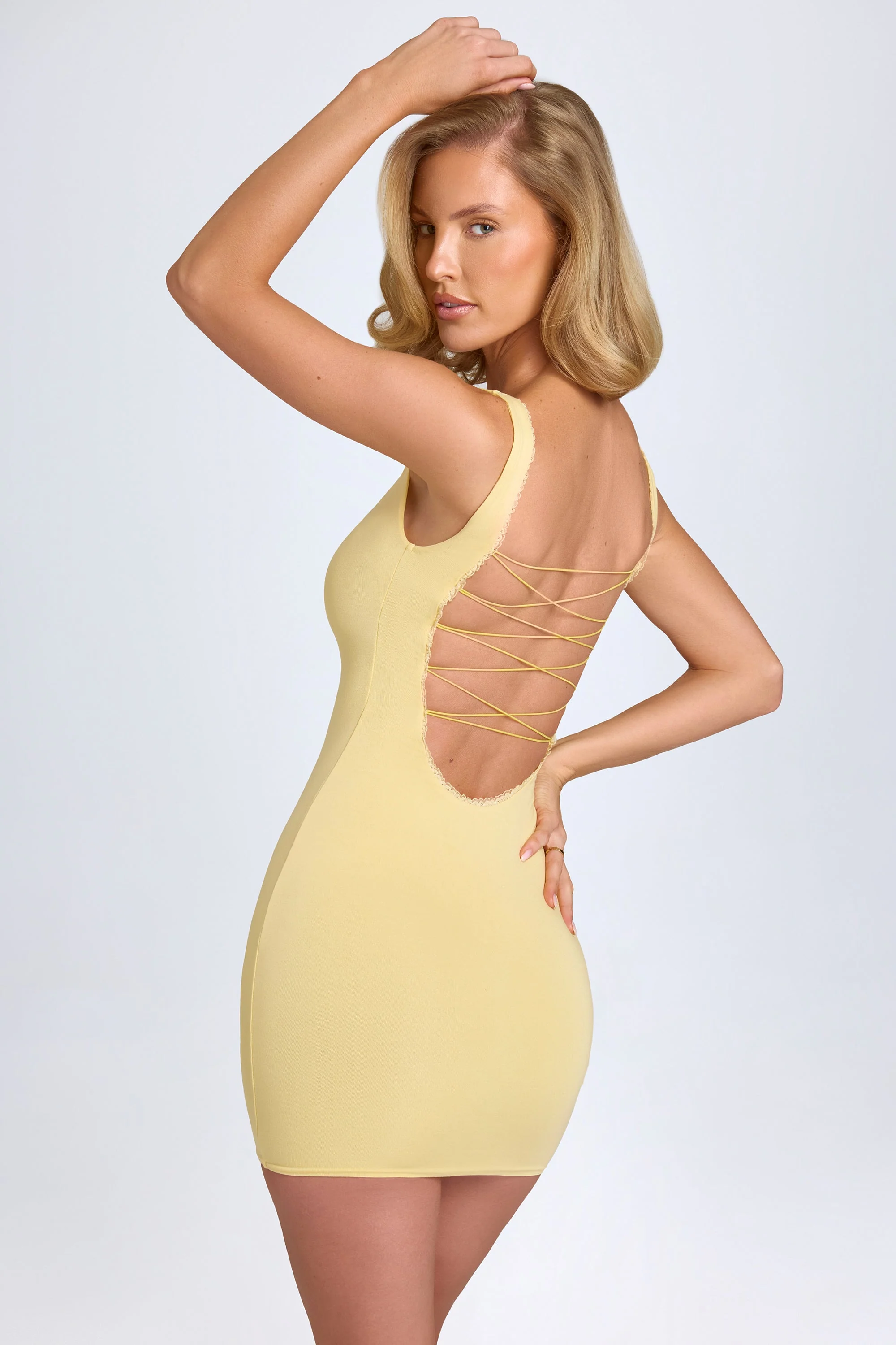 Modal Lace-Trim Bodycon Mini Dress in Pastel Yellow - Image 6