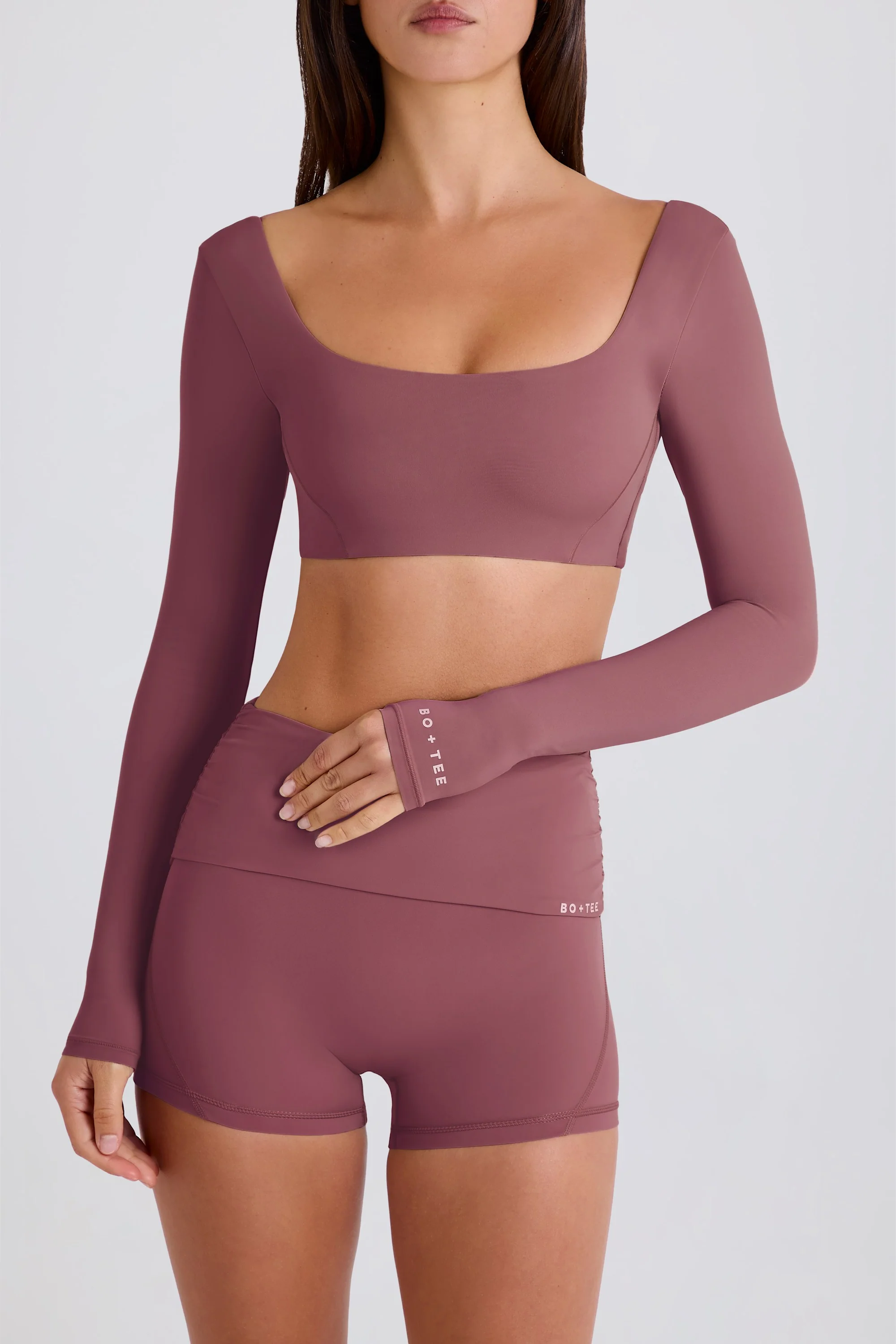Four-Way Stretch Foldover Mid-Rise Mini Shorts in Acai - Image 6