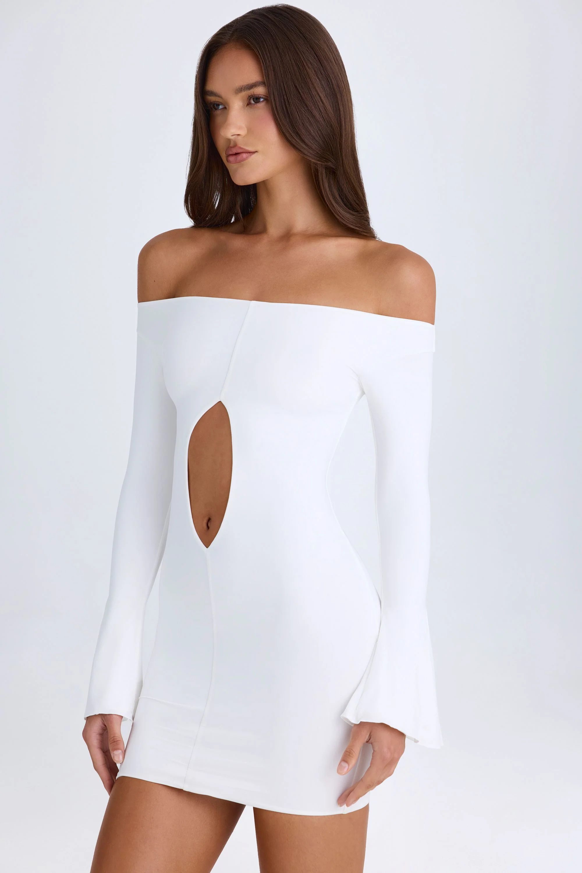 Off-Shoulder Cut-Out Mini Dress in White - Image 7