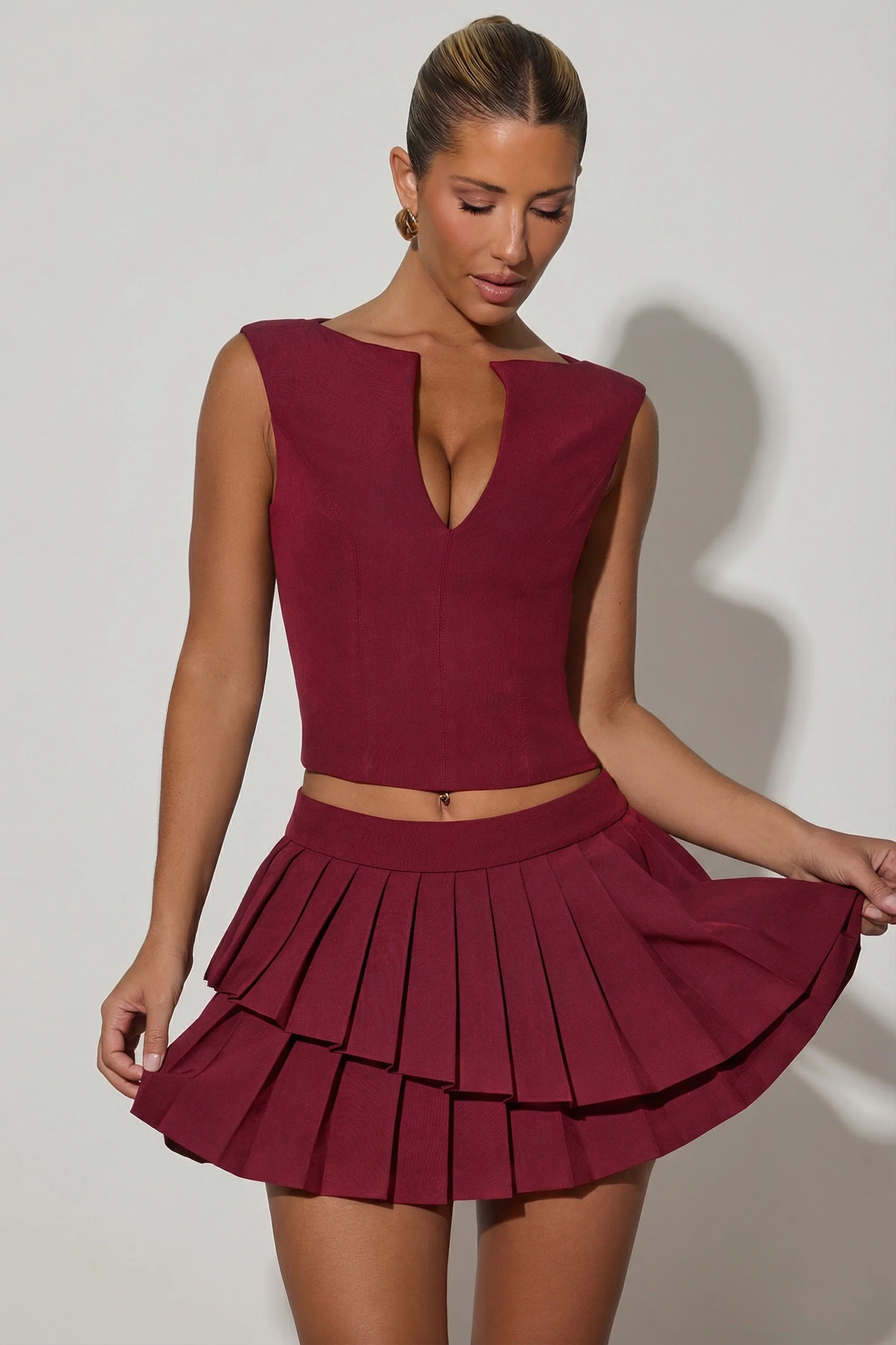 Layered Pleated Low-Rise Mini Skirt in Wine Red - Image 6