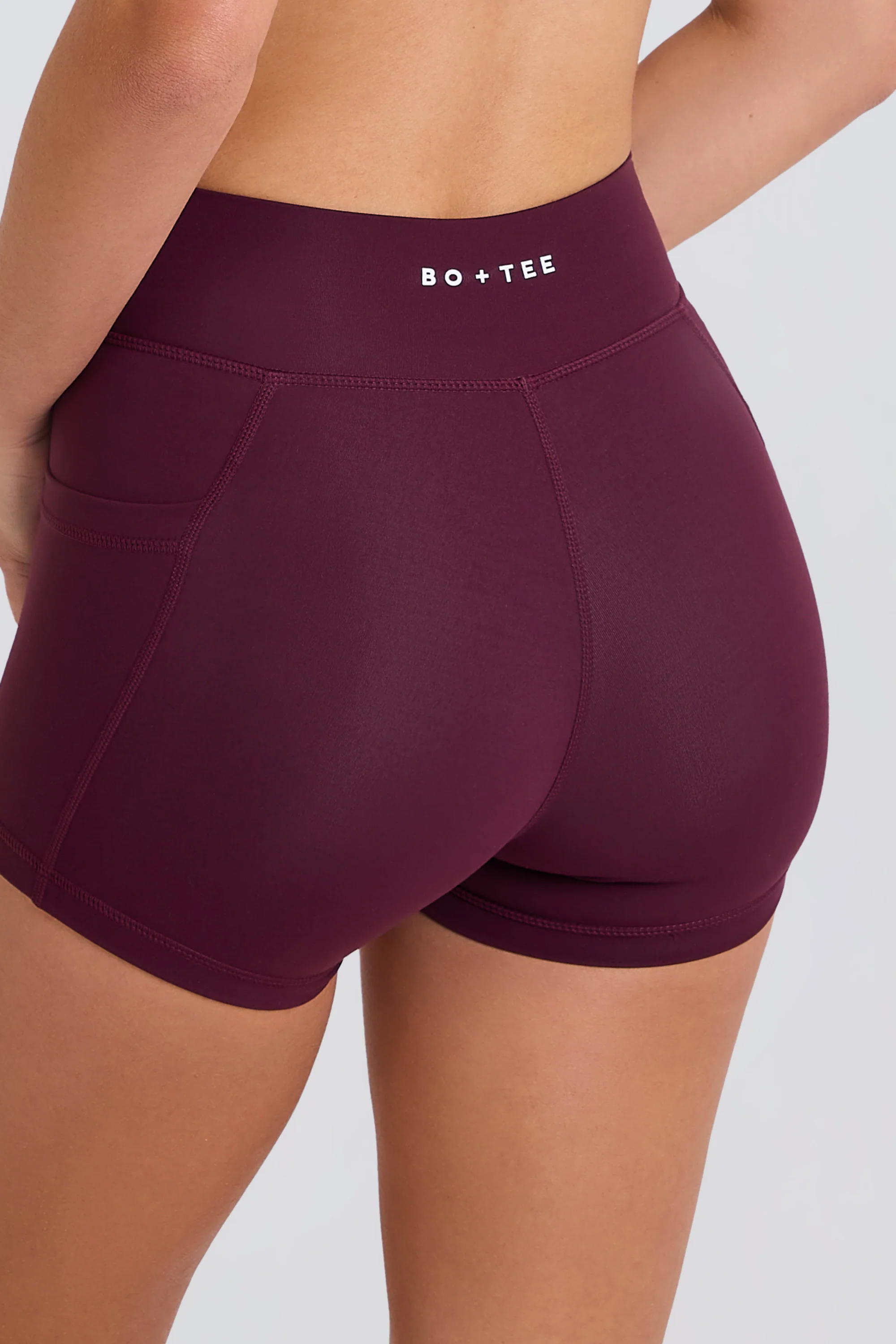Soft Active V-Waist Pocket Mini Shorts in Burgundy - Image 2