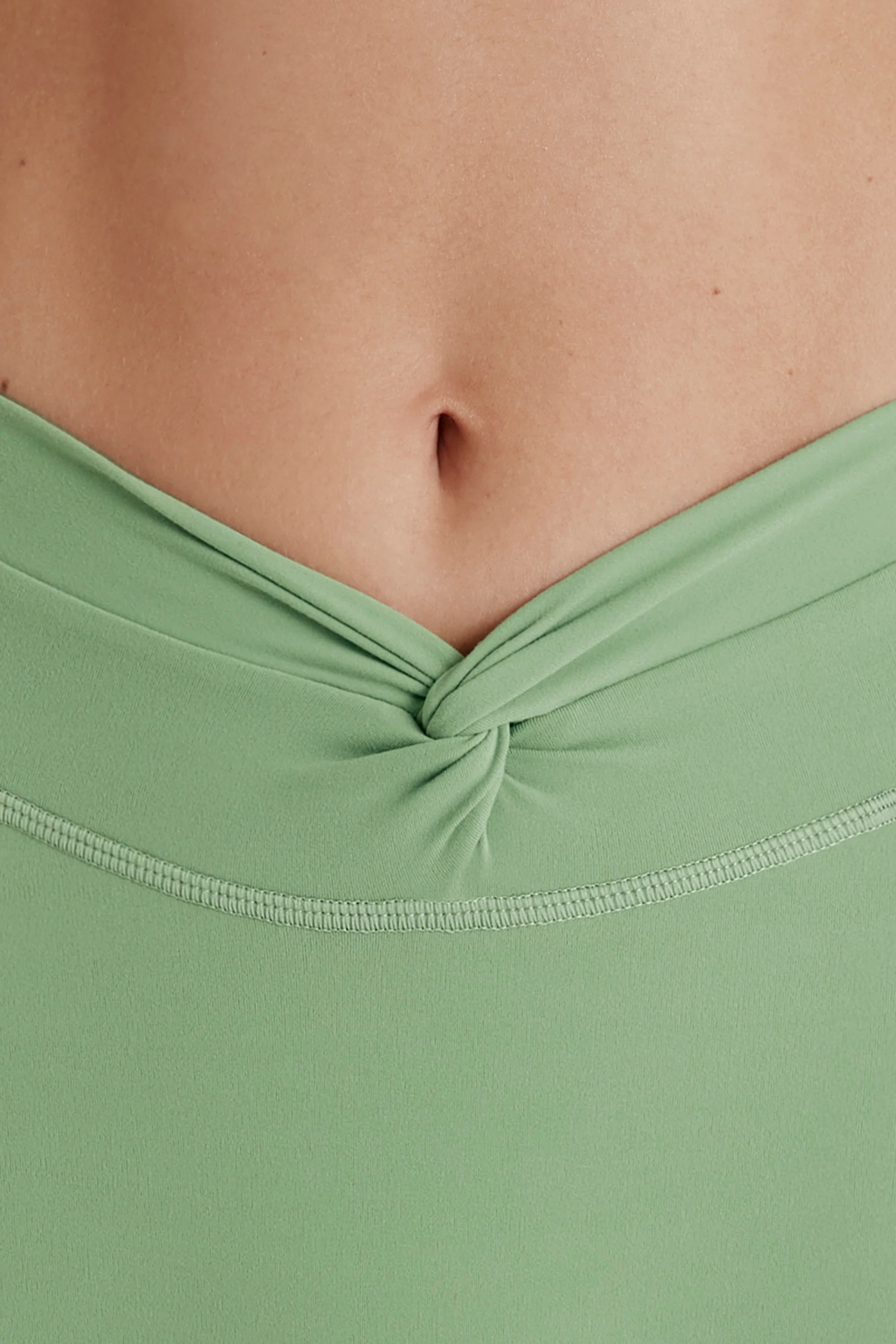 Soft Active Twist-Front Mini Shorts in Green - Image 5