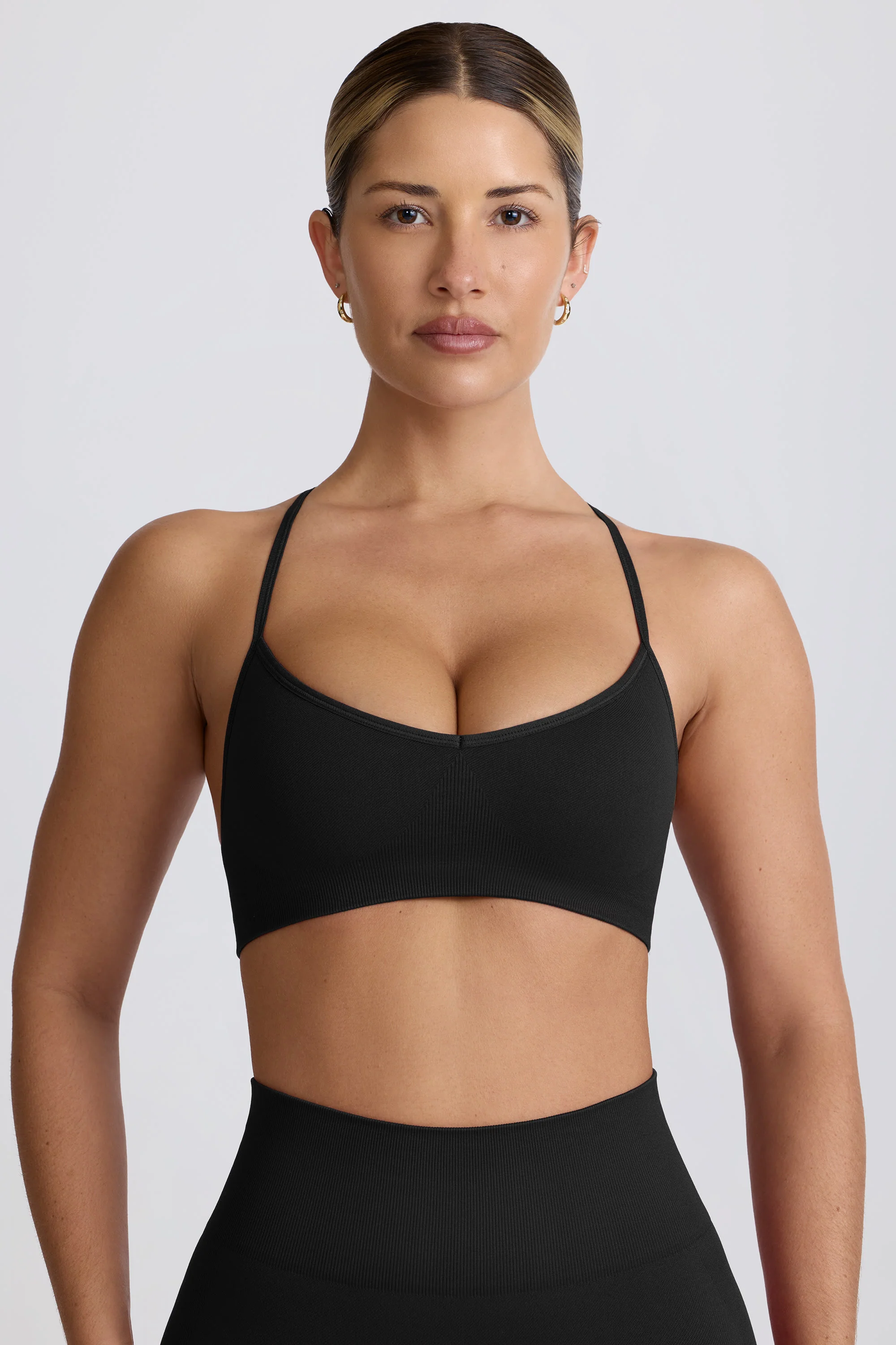 Super Sculpt Seamless Cross-Back Sports Bra in Black - Image 6