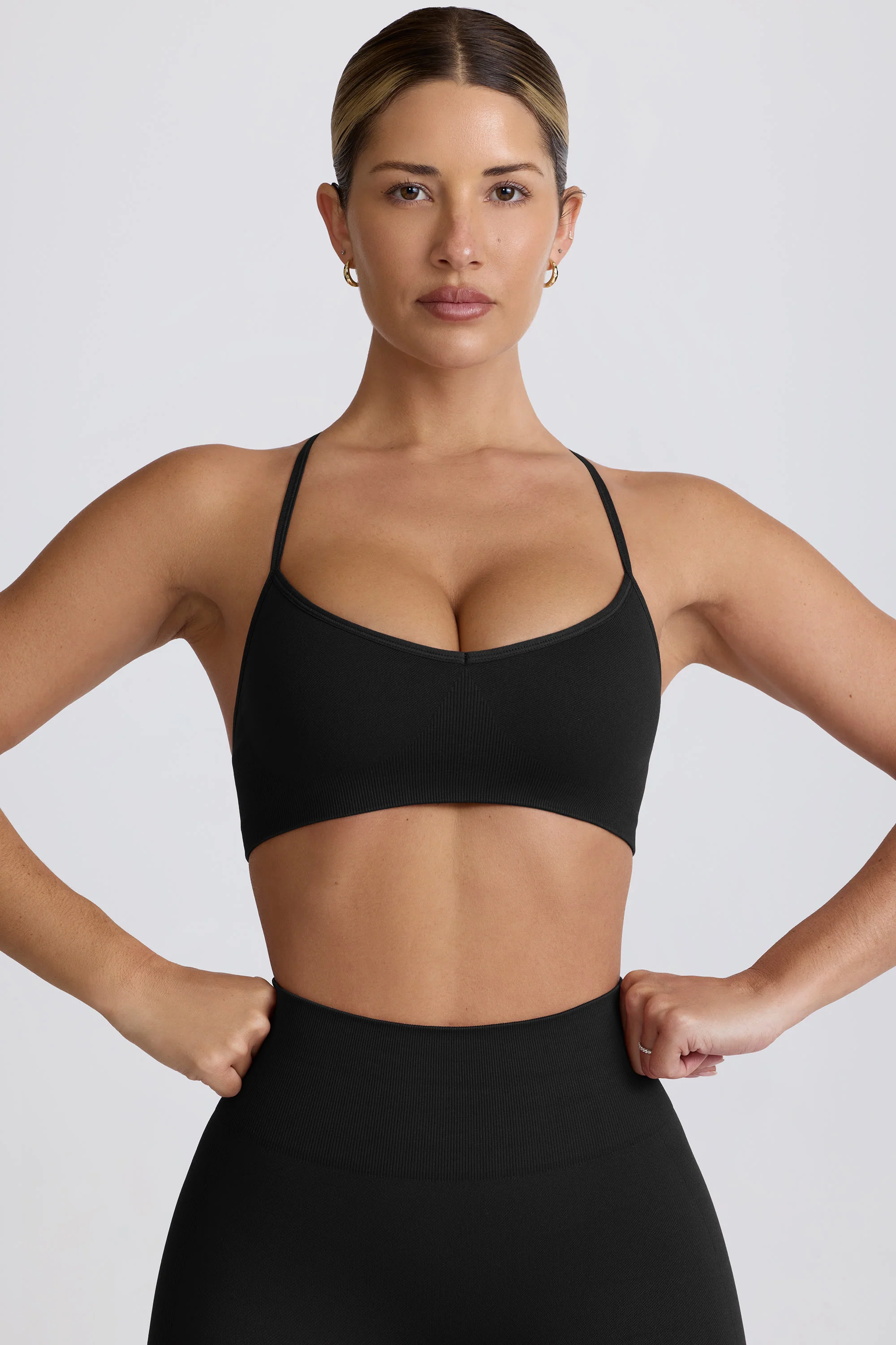Super Sculpt Seamless Cross-Back Sports Bra in Black - Image 8