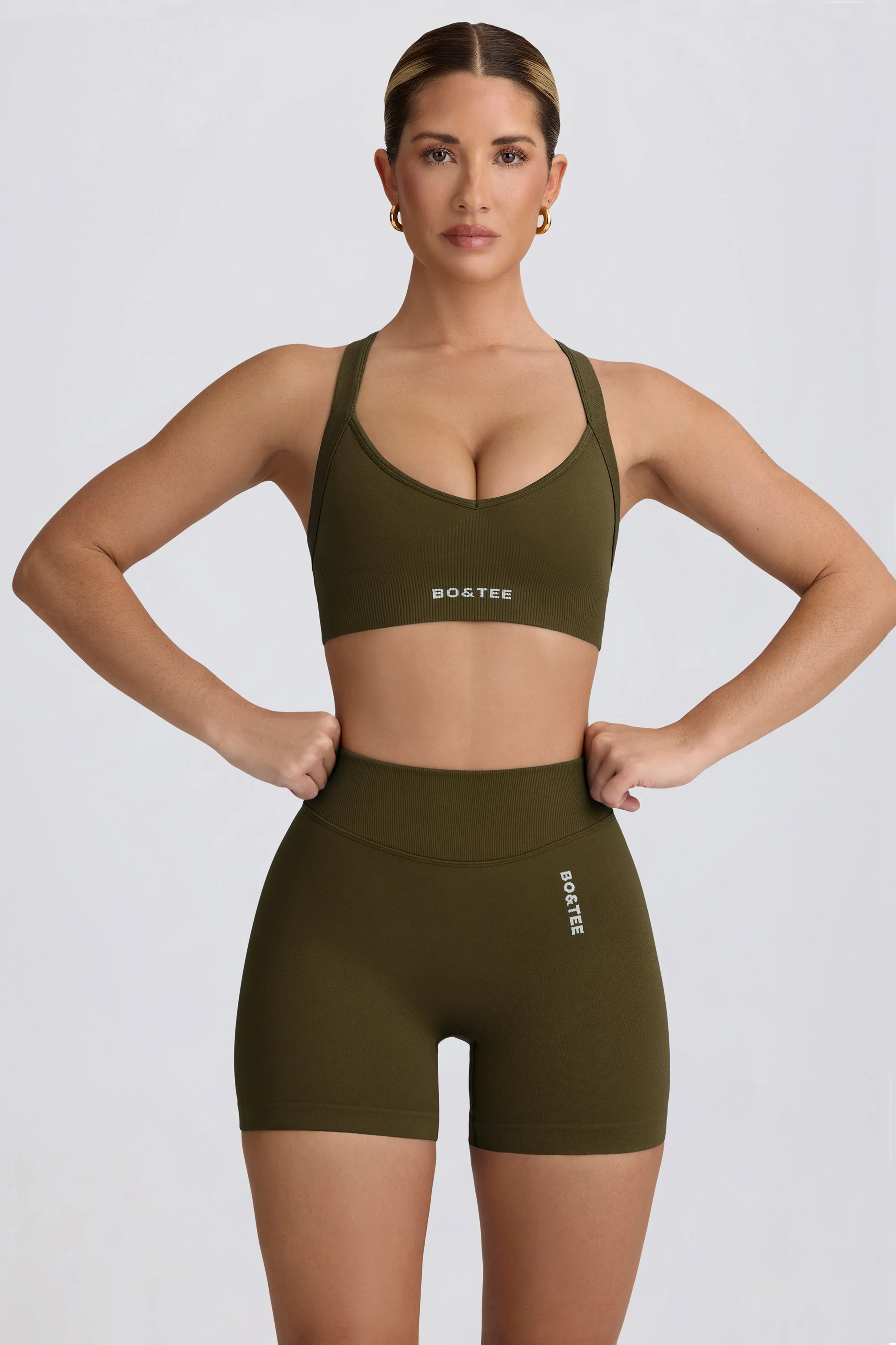 Super Sculpt Seamless Mini Shorts in Dark Green - Image 5