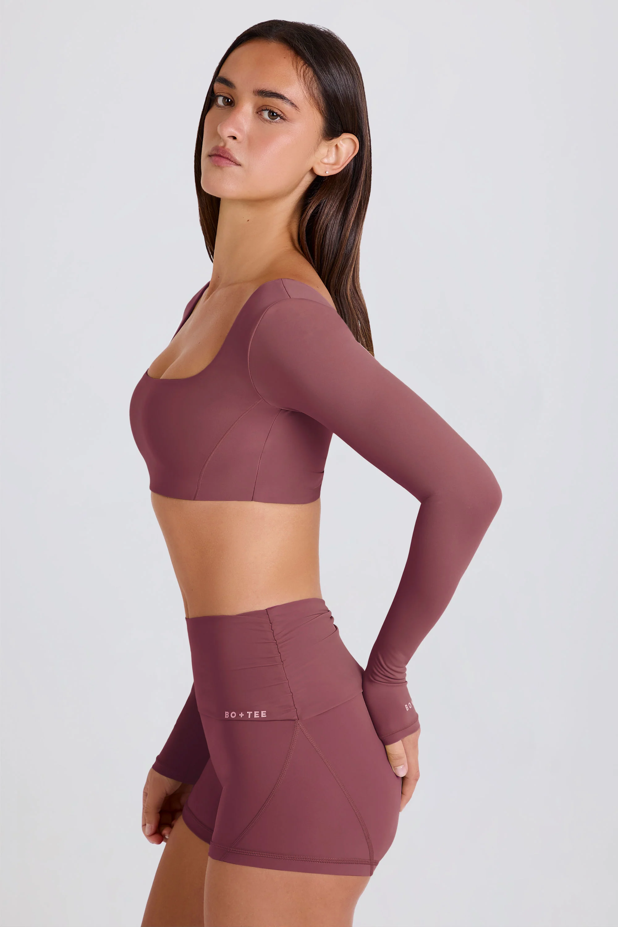 Four-Way Stretch Multiway Long-Sleeve Crop Top in Acai - Image 3