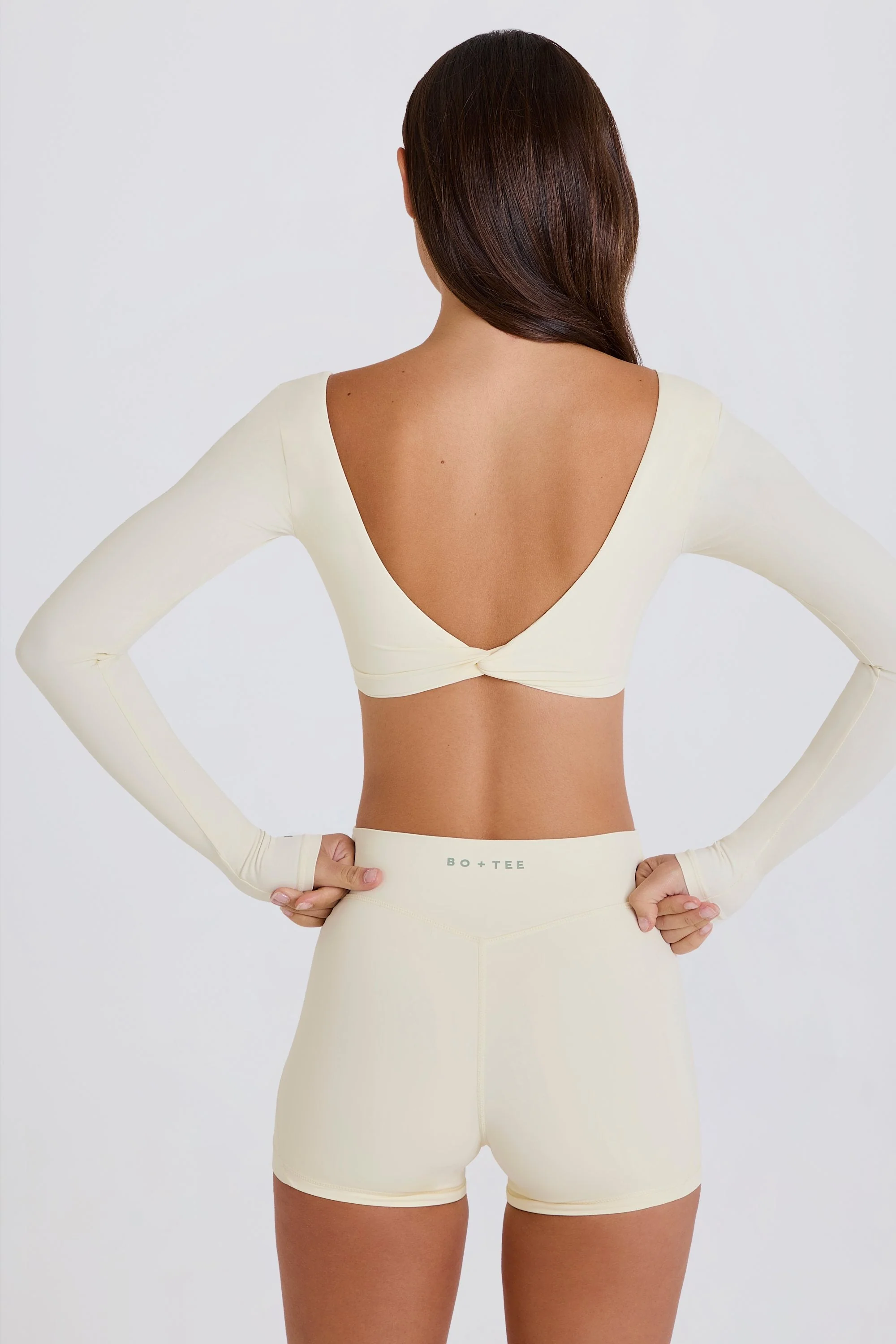 Four-Way Stretch Multiway Long-Sleeve Crop Top in Cream - Image 4