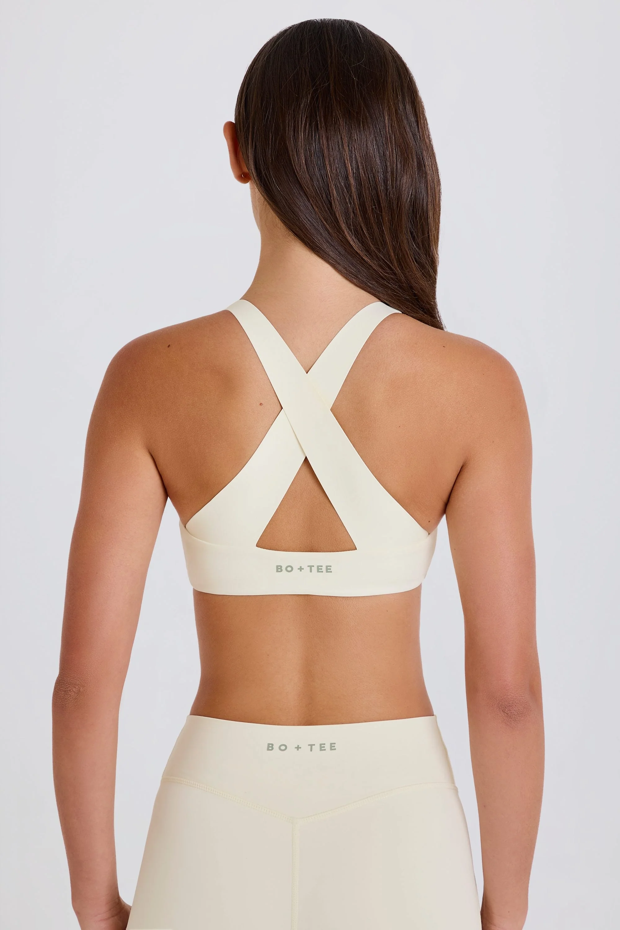 Four-Way Stretch Crossback V-Neck Sports Bra in Cream - Image 4