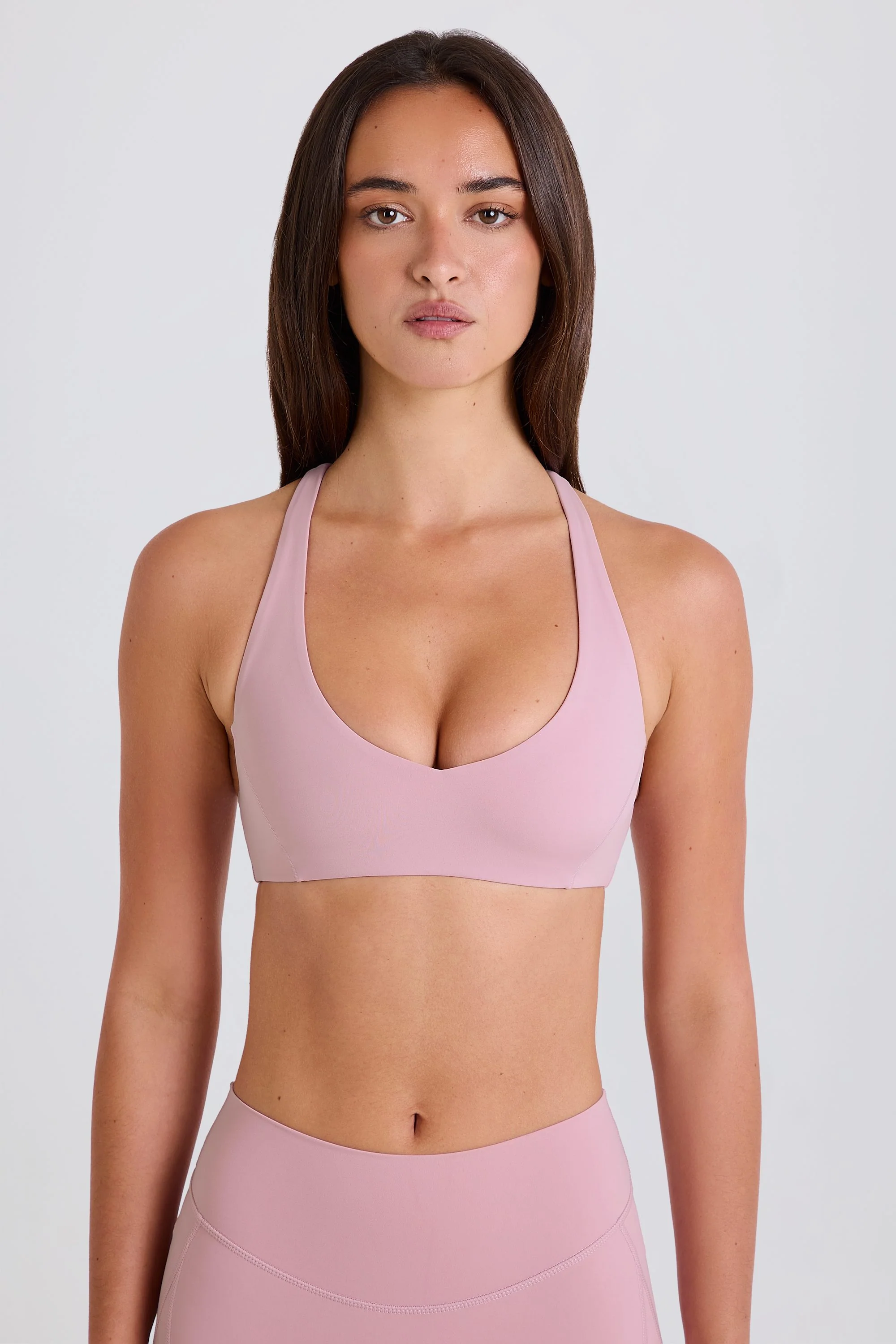 Four-Way Stretch Crossback V-Neck Sports Bra in Mauve - Image 12